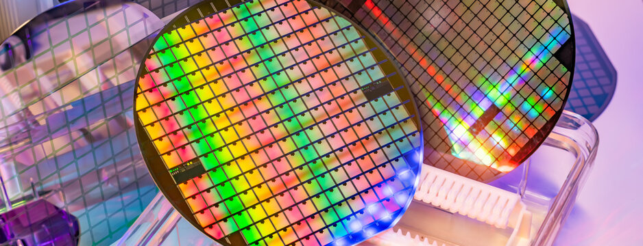 Silicon Wafers in white plastic holder box used in electronics for the fabrication of integrated circuits.AI Hardware and Semiconductor Industry Concept.
