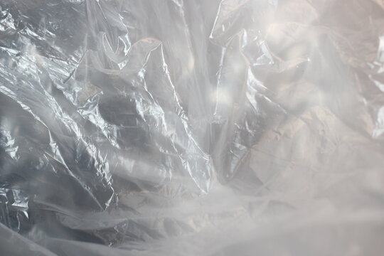 close-up texture shot of crumpled, transparent plastic material.