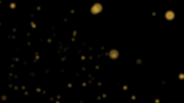 Abstract background with scattered golden circular bokeh lights on dark black space. Suitable for festive designs, holiday concepts, elegant themes.