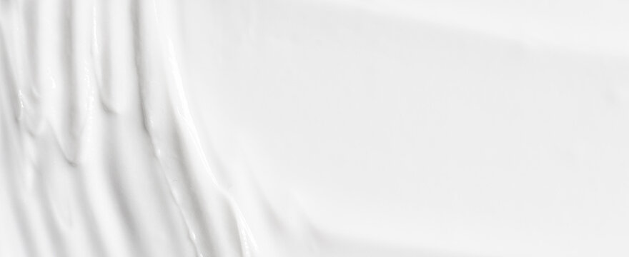 The white texture of cosmetic body cream. Copy space