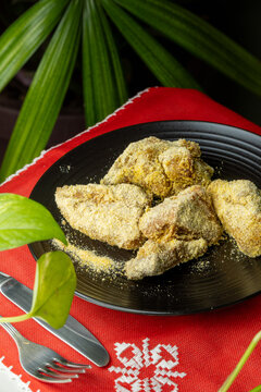 Plated Chicharo Huiti Traditional Pork Dish on Ao Poi Cloth