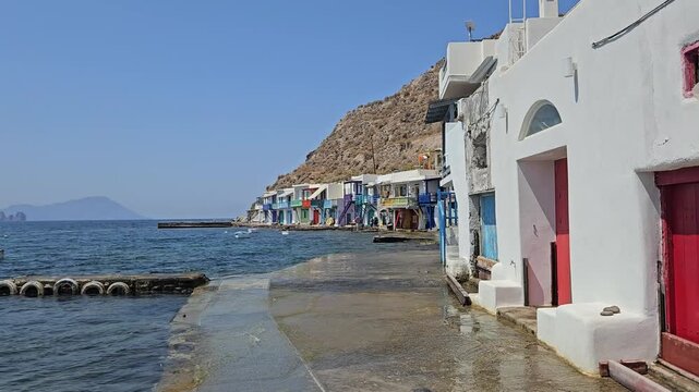 Klima village traditional fisherman boat houses with colorful doors on Milos Island, Greece