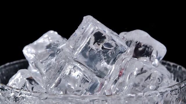 Water Droplets Falling onto Ice Cubes in Slow Motion