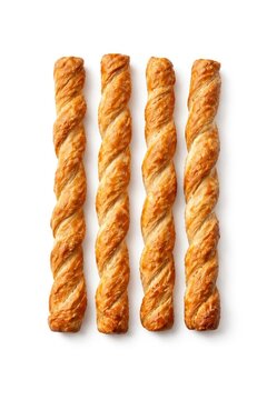 Four twisted breadsticks arranged in a row on a white background.