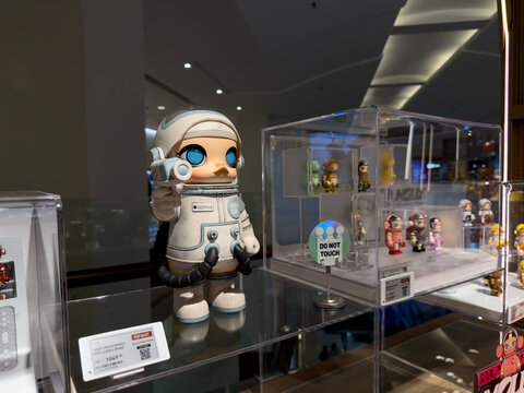 PENANG, MALAYSIA - JUL 21, 2026: Mega Space Molly astronaut collectible figure displayed inside Pop Mart retail store.