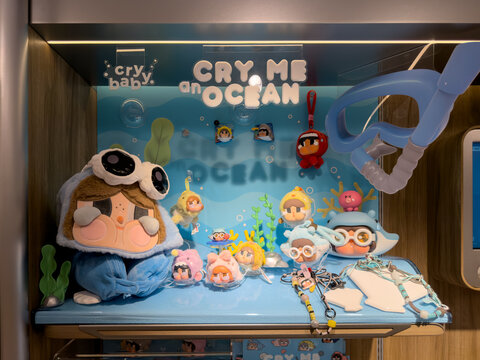 PENANG, MALAYSIA - JUL 21, 2026: Crybaby An Ocean themed collectible display with plush toys and accessories inside Pop Mart store.