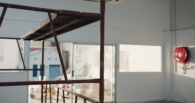 Renovation, construction site and empty building with interior, property development or upgrade. Maintenance, work in progress and remodeling for real estate restoration, repair or support structure