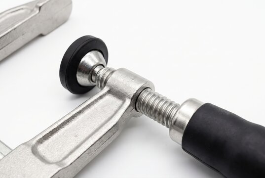 Metal bar clamp macro tool detail for woodworking and construction