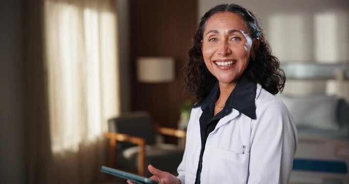 Face, doctor and smile in hospital with tablet, research and medical records for patient care. Portrait, mature woman and surgeon in icu ward with digital, telehealth and test results for healthcare