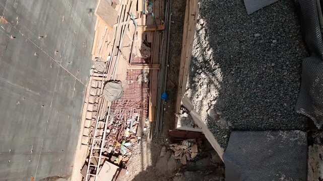 Groundwork and concrete foundation pouring at a major civil engineering construction project.