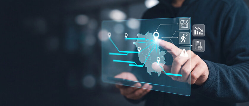 Business person using digital interface with map and data analytics icons for location intelligence and market analysis