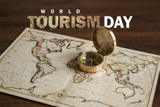 World tourism day celebration concept with antique compass placed on vintage world