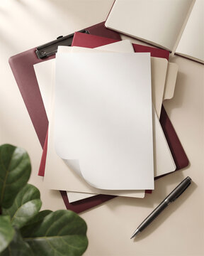 Blank paper mockup on stacked folders and clipboard top view flat lay