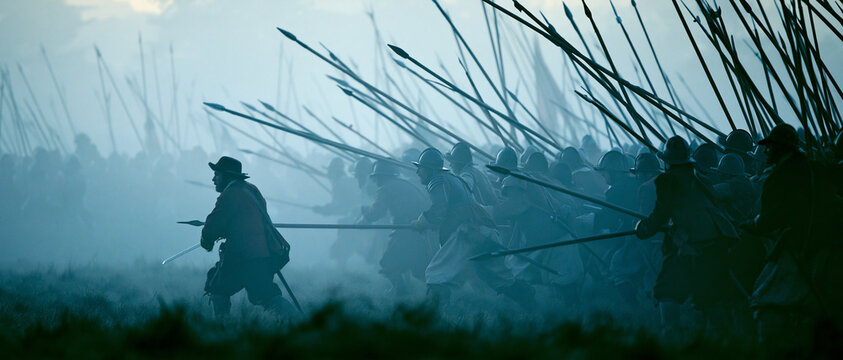 Medieval Battle Reenactment: Soldiers in Foggy Skirmish with Spears and Infantry in Dramatic Combat Tension