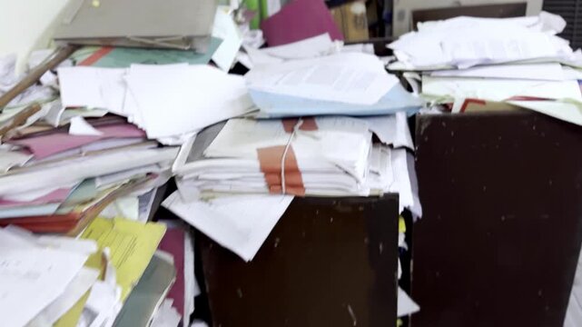Old Records and Files Lying Outside Office Corridor Highlighting Poor Document Storage, Administrative Neglect and Workplace Management Issues Indoors