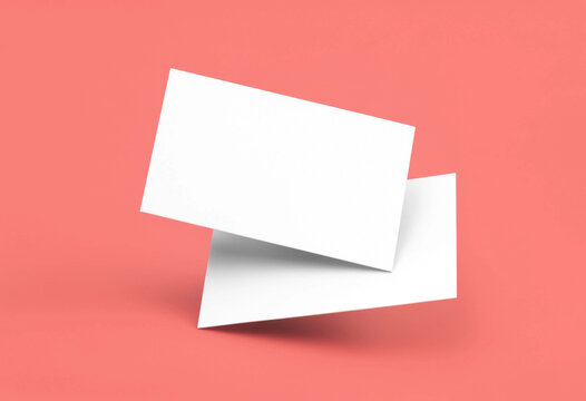 3D rendering mockup of blank white floating business cards on coral peach background