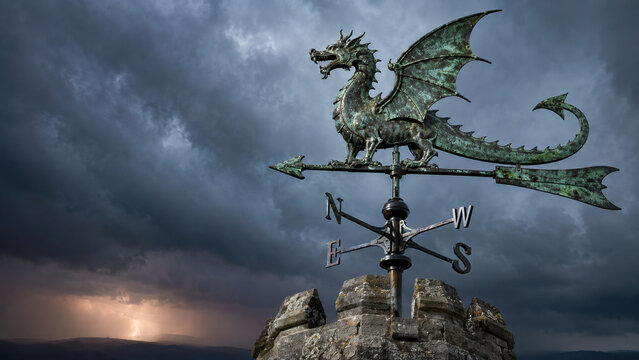 Dragon weather vane above ancient stone tower beneath an approaching thunderstorm