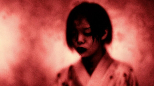 Blurred Ghostly Woman in Crimson Mist with Vintage Horror Texture