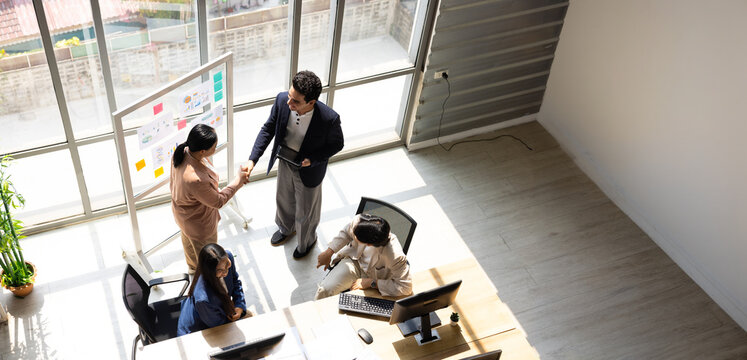 Trust, business partner handshake, Colleagues shaking hands Successful deal after great meeting, celebration partnership and business deal in office meeting client customer business partner
