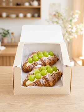 Green grape cream croissants in a bakery box