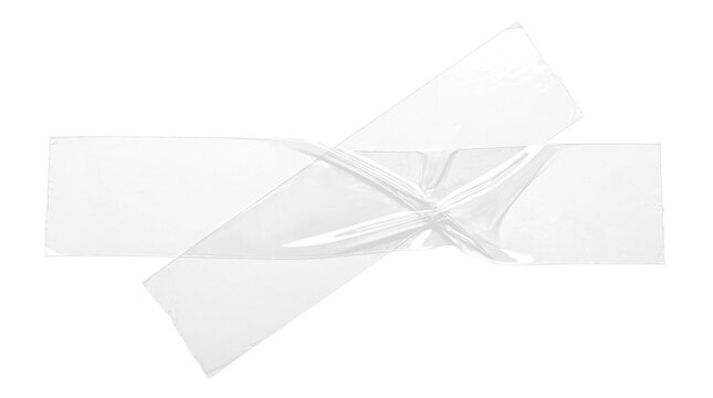 Crossed translucent  wrinkled clear adhesive sticky tape strips on a transparent background