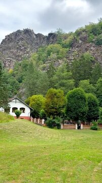 Cottage with Green Meadow and Forested Hills in Divoka Sarka Prague