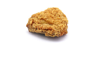 Breaded and fried chicken on a white background. © Pisan