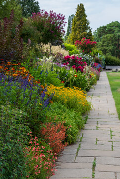 Stunning, colourful mixed flower border at Wisley garden, Surrey UK. The extensive flower beds are planted mainly wtih perennial plants.