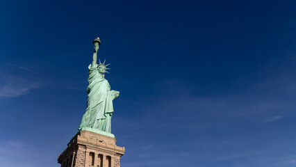 Statue of Liberty looking to a right full of space on a sunny day, in New York, United States © ph_sadore
