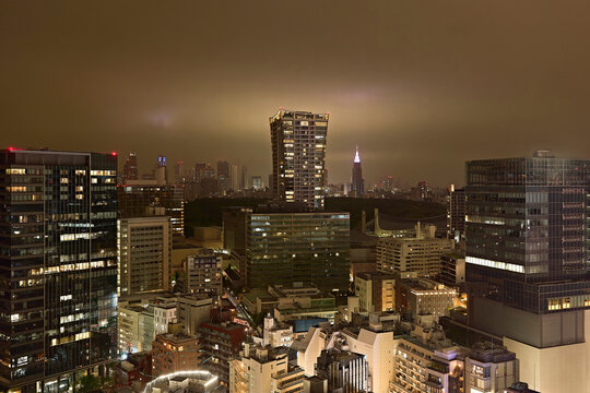 City Skyline at Night With Buildings and Lights in Shibuya, Tokyo