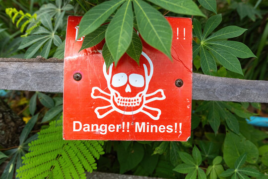 Warning sign informing about the mine field in Cambodia