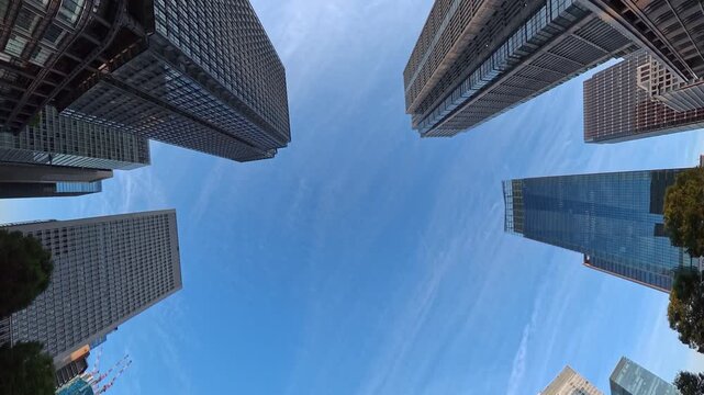 TOKYO, JAPAN - JULY 2026 : View of modern office buildings and skyscrapers around Tokyo Station. Concept of Japanese corporate business, financial hub and urban technology.
