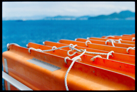 Boat Equipment Rests on Vessel Near the Water