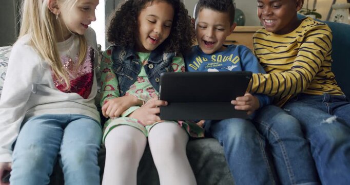 Children, friends and tablet on a sofa for cartoon streaming or watching video, show or movies in house together. Digital, search and group of kids online in living room with fun, learning or games