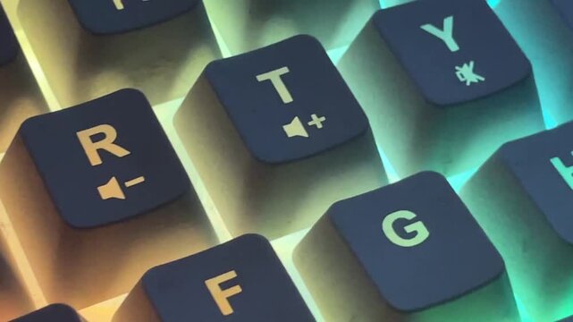 Vertical closeup red backlit mechanical keyboard keys casting warm orange glow over textured keycaps intense esports mood