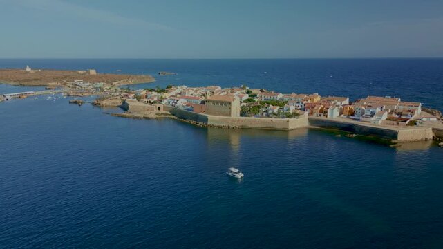 Tabarca island, Alicante, Spain, a charming mediterranean coastal village and historic fortress surrounded by deep blue sea, an idyllic destination for european summer travel - stock video
