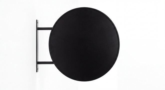 Blank black circular shop sign mounted on white wall mockup template