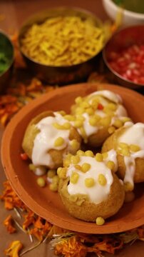 Dahi puri or dahi batashe an indian sweet,tangy and spicy snack