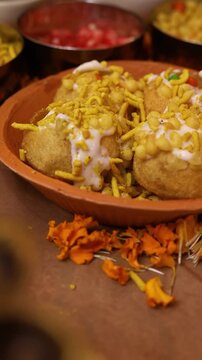 Dahi puri or dahi batashe an indian sweet,tangy and spicy snack