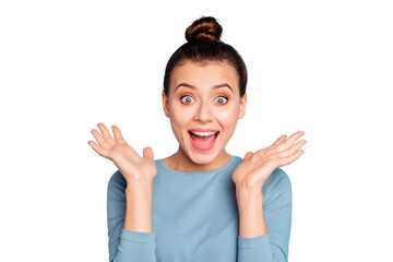 Close up photo cute charming lady astonished impressed incredible news gift present desire dream surprise shout scream open mouth raise hand palm dressed modern cotton outfit isolated blue background