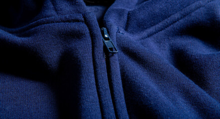 Dark blue jacket over white background © jeson