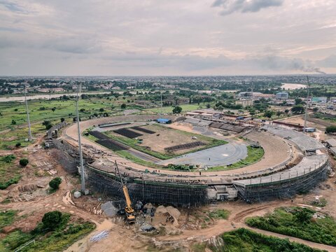 Aerial view of Ahmadu Bello Stadium in Kaduna, showing ongoing construction work, stadium seating, and the surrounding landscape in Kaduna, Kaduna, Nigeria.