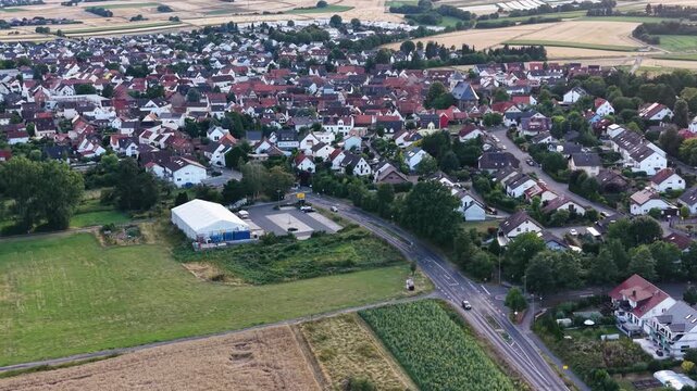  Aerial panorama view around the old town beside the city Mittelbuchen, 63454 Hanau in Germany on a sunny summer noon
