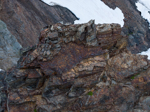 Rugged Rocky Cliff Face On Snowy Mountain In British Columbia, Canada &mdash; Alpine Geology And Texture