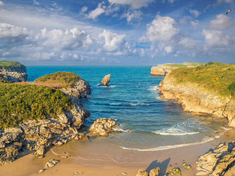 Seascape in the morning. Rocky sea coast. Beach Playa de Buelna, Asturias, Spain