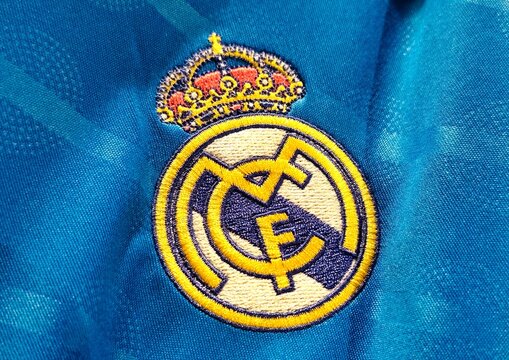 Photo of the embroidered emblem of Real Madrid CF on the 2025&ndash;2026 third kit. Real Madrid Club de F&uacute;tbol is a Spanish professional association football club based in Madrid.
