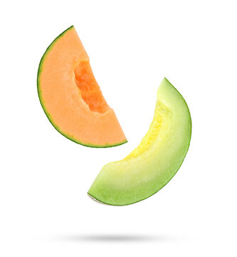 Slices of cantaloupe melon falling in the air isolated on transparent background. PNG