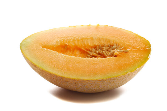Cantaloupe melon, honeydew half isolated on white background, side view	