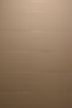 A dreamy view of a tile wall.