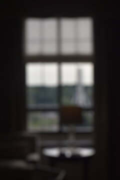 A dreamy view of a window in the dark.